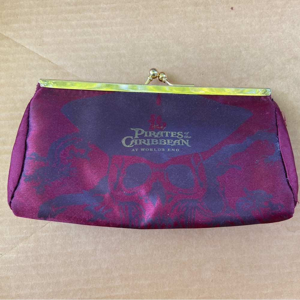Maroon and gold Pirates of the Caribbean coin purse/wallet/clutch. Disney